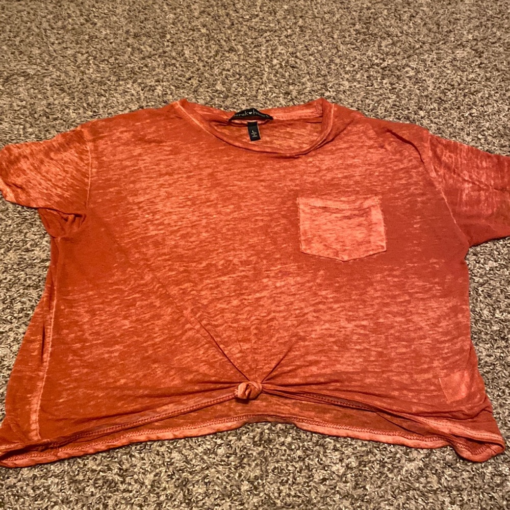 It’s a cute shirt, with a little pocket on the side very comfy